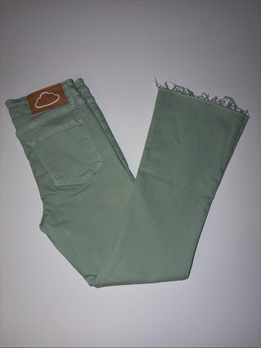 Frame Denim Mint Green Wide-Leg Jeans with Frayed Hem